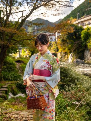 A kimono-clad woman strolling in Gifu