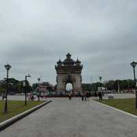 Ascending to Elegance: Patuxay's Embrace Above Vientiane