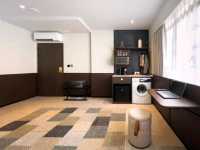 Interiors are clean, minimalist, and smart, featuring comfortable bedding, smart TVs, and en-suite