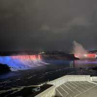 "Spanning Splendor: The Rainbow Bridge and Nigeria Falls Unveil Nature's Majesty"