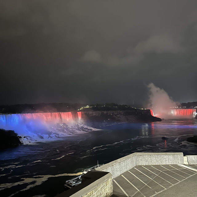 "Spanning Splendor: The Rainbow Bridge and Nigeria Falls Unveil Nature's Majesty"