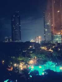Enjoying the pool side view at Edsa Shangri-la Hotel 