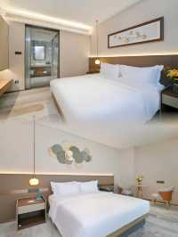 青島上合寶藏酒店!中式園林風+靜謐度假感,遛娃出差都適配