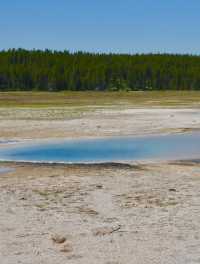 Check-in at the natural wonder of the world - Yellowstone's Thumb Geyser.