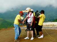 Fly High: My Epic Paragliding Adventure at Paralayang Puncak
