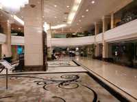 "The Promenade Hotel-Where City Convenience Meets Cozy Comfort"