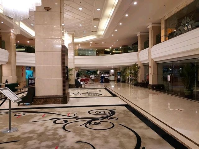 "The Promenade Hotel-Where City Convenience Meets Cozy Comfort"