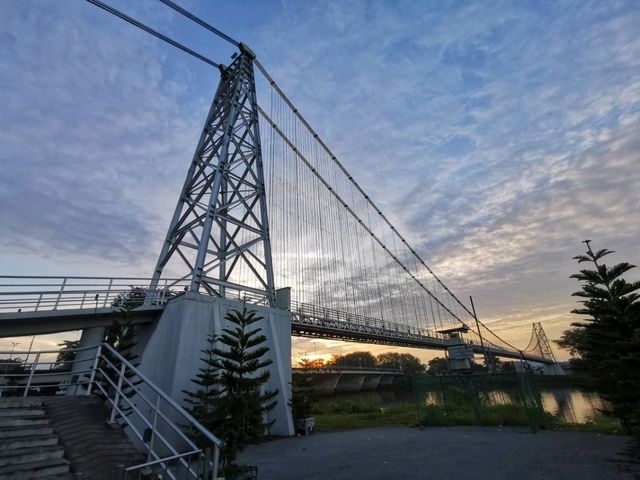 Dawn Splendor at Kuching’s Satok Suspension Bridge  