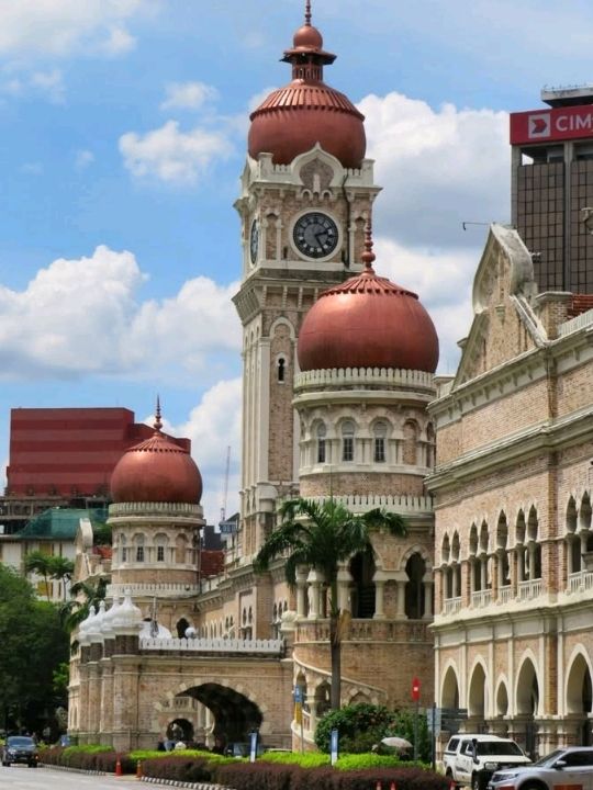 This historic iconic building looks magnificent and well-maintained, and is lit up with colorful lig