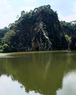 🏔️✨ My Morning Jog at Little Guilin — Bukit Batok’s Hidden Granite Gem! 🇸🇬💚

If you haven’t checked out Little Guilin, you’re totally missing out. This spot is pure Singapore west side magic: epic granite cliffs rising out of a glassy lake, giving total “China vibes” right in Bukit Batok. 🤩 The park is located at Bukit Batok East Avenue 5, Singapore 659761—super easy to find and free to wander anytime.

Hit it up early and you’ll catch the golden sunrise washing over those dramatic rocks, making the whole place glow. The water turns mirror-like and reflects everything perfectly, so get ready for some insta-worthy shots. 🌅🎨

The main jogging loop is ultra chill—smooth paths, gentle breezes and tall trees offering shade as you walk or run. Best part? Hardly anyone’s around. You’ll mostly hear birds chirping and leaves rustling (ASMR moment, anyone?). 🐦🍃 Every corner brings a new view, with quiet little spots to just sit, pause and soak up all the serene vibes.

Little Guilin feels so far removed from the busy city, but it’s literally right in the neighborhood. Whether you’re in the mood for a calming stroll, fresh air, or just some epic scenery, this place is sooo good. ✨💚

Highly recommend it for morning escapes, solo chill sessions, or quick nature breaks. You’ll love the peaceful, photogenic energy—total west side gem.

📍 Little Guilin (Bukit Batok Town Park), Bukit Batok East Avenue 5, Singapore 659761  
Opening hours: Open daily, 24/7  
Perfect for: Morning walks, jogs, quiet scenes and nature lovers