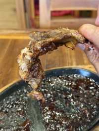 Steamy pork ribs in Kuta wooden shack