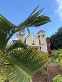 Seminari Sinar Buana: A Bright Yellow Church with a Serene Garden