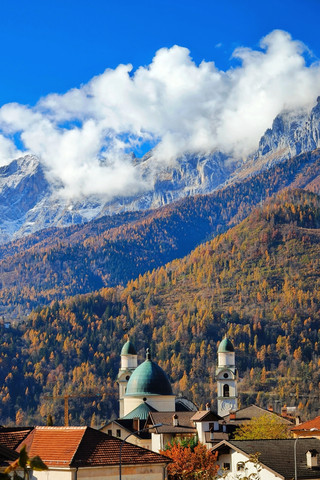 I usually prefer staying home in Jakarta on weekends, tending to my plants. But a recent trip took me from Venice into the Dolomites, and I found a quiet pace that suited me.

If you want to escape the crowds of Venice, driving north is a good option. Here are a few spots that stood out for their stillness.

· *Belluno**
We chose to stay here. It is a practical gateway town. It lacks the tourist gloss of the deeper valleys, which is exactly why I liked it. It is quiet, affordable, and has everything you need to stock up on.

· *Lago di Santa Croce**
A short detour from the main road. The lake was cold and beautifully still, surrounded by autumn trees. It felt far away from the usual Instagram spots.

· *Val di Funes**
The view of the Geisler peaks from the valley is indeed classic. The Ranui church sits quietly in the field. It is a good place to just sit and watch the sunset light.

· *A few notes for the road:**
· Pick up your car at Mestre, as you cannot drive in Venice.
· Download offline maps. Signal gets weak once you enter the mountains.
· The mountain shortcuts are scenic but narrow. If you are not used to sharp bends, I personally wouldn’t recommend driving them after sunset. Take the safer route back to Belluno instead.