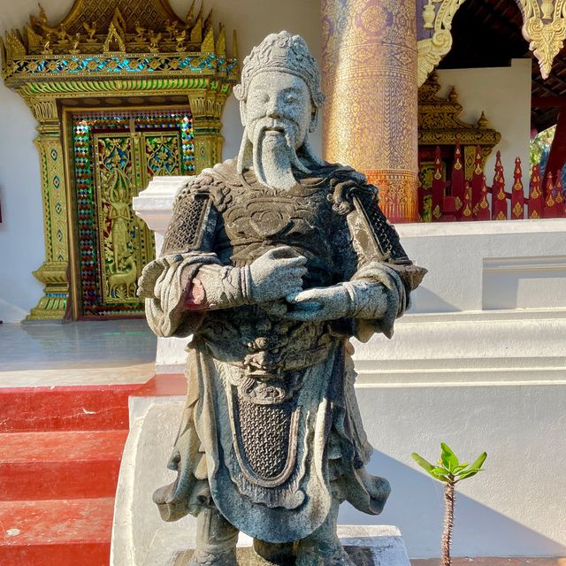 Guardians Embrace at Wat Choum