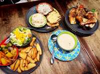Flame-Grilled Flavor in the Heart of Queensbay