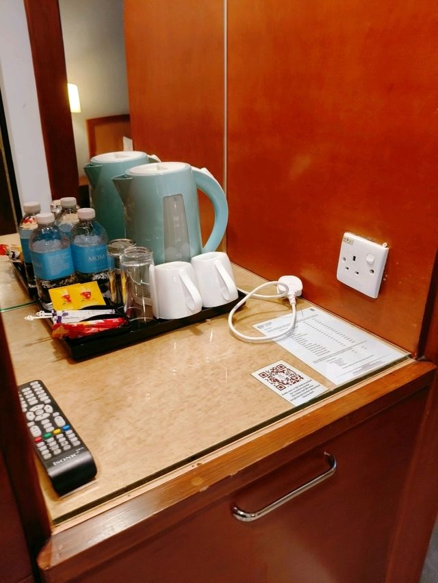 Explore Muar's Central Comfort: Classic Hotel - Your Gateway to Town & Taste!