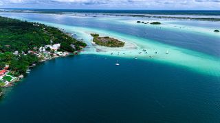 Cenote Esmeralda, Kayaks, Lagoon Shores, and a Jungle Stay Near Bacalar