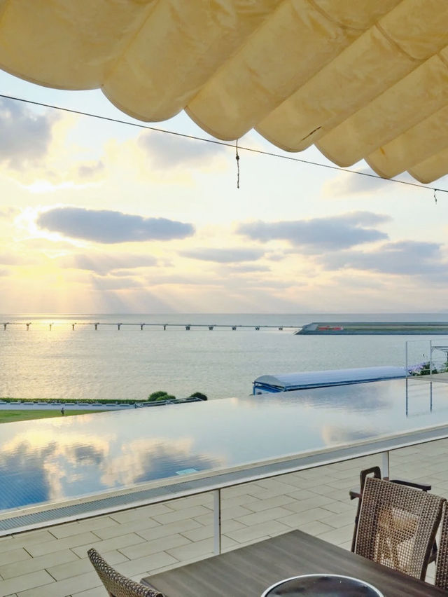 Okinawa vacation | soak in a private hot spring and watch the sunset, don't miss it if you love watching airplanes.