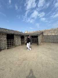 “Whispers of the Past: The Timeless Walls of Bahrain Fort”