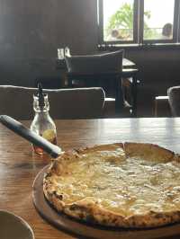 🍕✨ Pizza 4P’s Phnom Penh – A Slice of Sustainable Joy