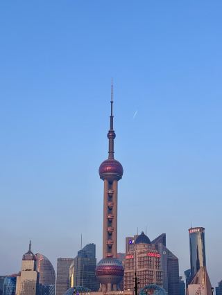 The Bund is overcrowded, while the North Bund stands quietly by the river.