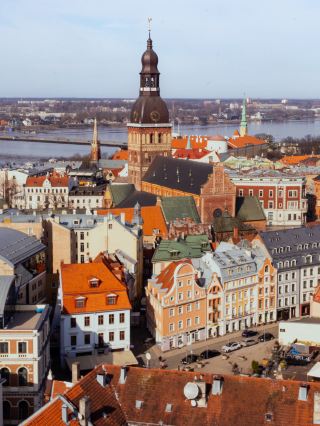 #europetrip 

🏰 Riga from Above: The Best View at St. Peter's Church

If you want to see Riga in all its glory, there is no better vantage point than the viewing gallery of St. Peter’s Church (Sv. Pētera baznīca). It’s the highest point in the Old Town, and the view from the top is absolutely breathtaking!
The Sky-High Experience
St. Peter’s is one of the oldest and most iconic symbols of the city. While the church itself is a beautiful example of Gothic architecture, the real treasure lies at 72 meters high.
What You’ll See:
· The Red Rooftops: From here, the maze of medieval streets in Old Riga (Vecrīga) looks like a fairytale miniature.
· The Daugava River: You get a perfect view of the majestic bridges - including the futuristic Vanšu Bridge - stretching across the water.
· The Central Market: You can clearly see the massive zeppelin hangars that now house one of Europe’s largest markets.
· The National Library: Look across the river to see the "Castle of Light," a striking contrast to the ancient spires of the Old Town.
💡 Pro Tips for Your Visit:
1. The Elevator Advantage: Unlike many medieval towers where you have to climb hundreds of narrow steps, St. Peter’s has a lift that takes you straight to the gallery. Perfect for saving your energy for more walking!
2. Mind the Wind: It is significantly windier and colder at the top than on the ground. Even on a sunny day, I recommend bringing a light jacket or scarf.
3. Photo Timing: If possible, visit in the late afternoon. The golden hour light hitting the terracotta tiles of the Old Town is a photographer's dream.
Final Verdict: If you only have time for one viewpoint in Riga, make it this one. It’s the perfect way to get your bearings and see the layout of this beautiful Baltic capital.

#Riga #Latvia #StPetersChurch #TravelLatvia #CityPanorama #Viewctagnt #RigaOldTown #TravelTips #BalticStates
