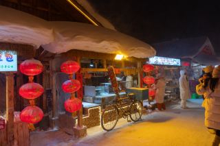 Blue-Hour Streets, Parade Movement, Market Food, and Lantern Portraits in Snow Town