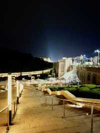 Flags, Lights & Midnight Calm – Putra Square at Night