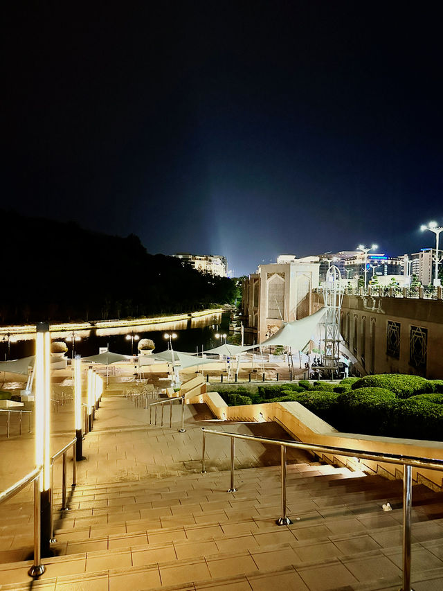 Flags, Lights & Midnight Calm – Putra Square at Night