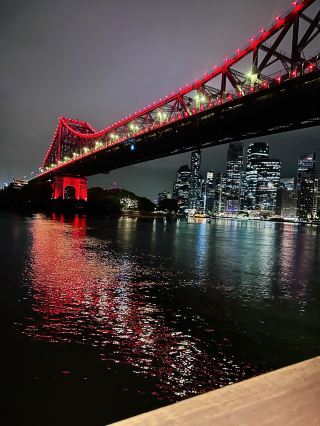 At night, the Story Bridge shimmers over the water, as if telling countless tales