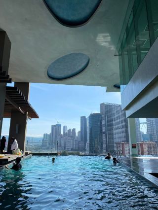 “Tamu Hotel & Suites — Where Malay Heritage Meets Modern Kuala Lumpur Skyline”