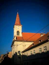 Sibiu: A Whimsical Waltz Through Watchful Rooftops
