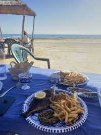 Yummy grilled fish with beach view in Djerba