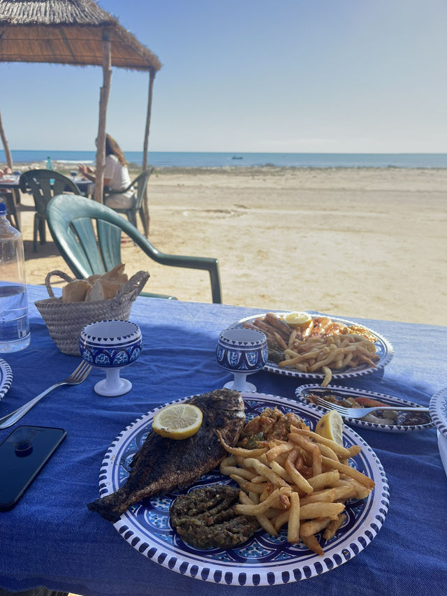 Yummy grilled fish with beach view in Djerba