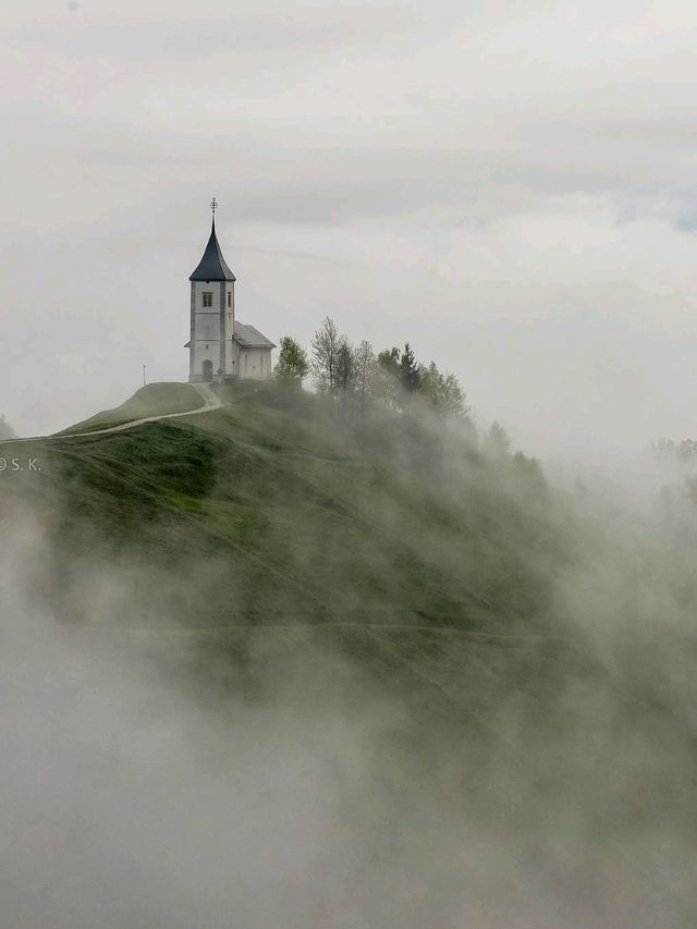 ⛪✨ “Heaven on a Hill: My Sunrise at Jamnik Church” 🌄📸