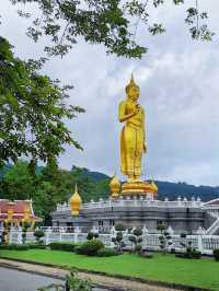 A colossal standing Golden Buddha in Hatyai
