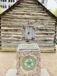 Explore the Pioneer Cabin at Dallas County Historical Plaza