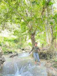 A Picturesque Two Tiered Waterfall located in the Lush of Hill in Alegria