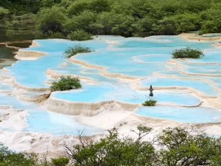 The Cascading Tiffany Blue of Huanglong's Five-Color Pond.