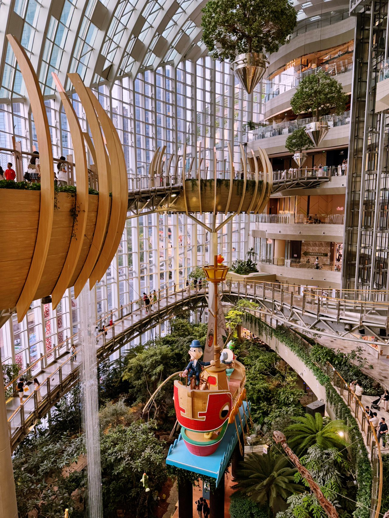 #footballlandmarks 

Welcome, we are traveling stars! ✨ 

If you want to see how the future of sports travel looks, you need to teleport straight to the iconic The Ring Shopping Mall in Chongqing. This place is unbelievable—it feels like a real-life sci-fi movie with massive "flying trees" and lush green islands hanging on different floors right inside the building! 🪐🌿But the real tactical play happened when I climbed up to the 3rd floor. Suspended right opposite the breathtaking indoor botanical jungle, I found the ultimate Coca-Cola World Cup Challenge Oasis! 🔴

🥤As a legendary global FIFA sponsor, Coca-Cola completely transformed this green island into a high-tech fan zone. The energy here is electric! You are surrounded by beautiful World Cup decorations, interactive football gaming screens, and goal-scoring challenges where you can win exclusive sports prizes. 🏆

⚽️Standing there, playing the challenge, and shouting for goals surrounded by flying trees gives you an incredible sense of global unity. You instantly feel connected to this grand, historic worldwide event, even thousands of miles away from the physical stadium pitches. I had so much fun, absorbed tons of positive energy, and scored some epic prizes. This is what true fan culture is all about—celebrating the beautiful game in the most spectacular locations on Earth!

🦅👇 What is the coolest football fan zone you have ever discovered inside a shopping mall? Let me know in the comments, my stars!

#footballfanculture #soccerlife #footballtravels #stadiumvibe #gamedayexperience #chongqing