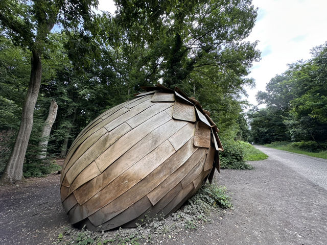 Art sculptures lost in a forest