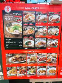 “Ah Cheng Laksa: Tradition with a Green Twist”