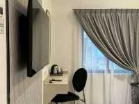 “Urban Nest: Signel Poshtel – Kota Kinabalu’s Stylish Capsule Escape”