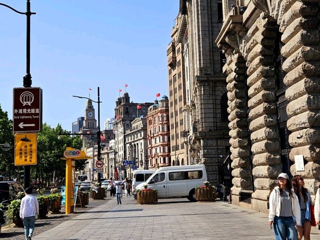 Taking a nice day time stroll across The Bund at Shanghai