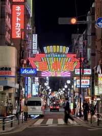 Dotonbori Street with neon light and food 