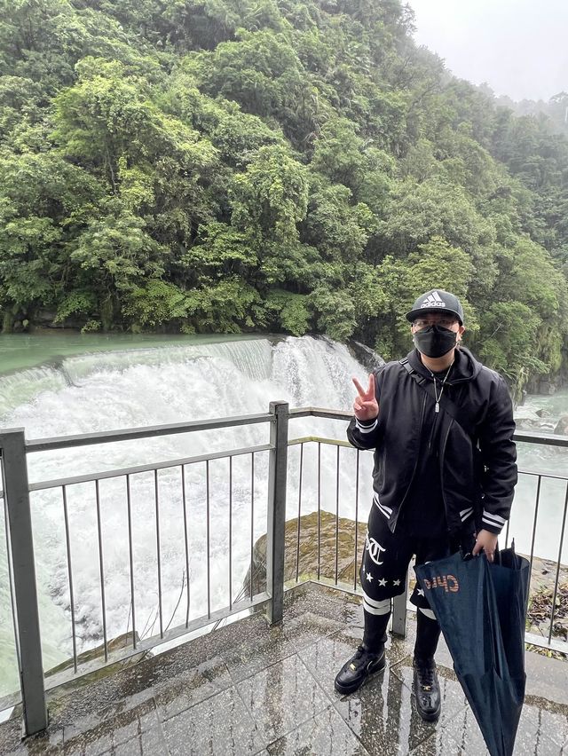 Exploring scenic waterfalls of Shifen. 