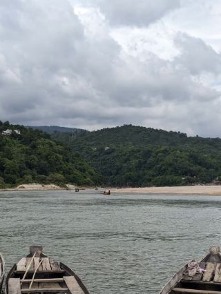 🏔️🌊 Jaflong — Where the Mountains Meet the River 🇧🇩

If you are planning a trip to Sylhet, Jaflong should be one of the first places on your itinerary. Located in Gowainghat Upazila of Sylhet District, Jaflong is one of the most famous natural attractions in Bangladesh.

What makes Jaflong special is its breathtaking combination of mountains, rivers, stones, greenery, and clouds. The area sits near the border of Bangladesh and India, with the beautiful Meghalaya hills visible across the border.

🌿 The Natural Beauty of Jaflong

The moment you arrive, the surrounding green hills and flowing river create an unforgettable view. During the rainy season, water comes down from the hills, making the rivers and streams more vibrant.

The Piyain River flows through the area, and its clear water, colorful stones, and surrounding greenery make it a perfect place for photography and relaxation.

🚤 Boat Ride

One of the best experiences in Jaflong is taking a boat ride on the river. You can travel through the calm waters while enjoying the hills and green landscape around you.

On a sunny day, the combination of clear water, white stones, blue sky, and green hills can look absolutely stunning. 📸

🪨 Famous Jaflong Stones

Jaflong is also well known for its natural stones. The river carries stones down from the hills, creating beautiful rocky areas along the riverbanks.

You can walk around the stone-covered areas, enjoy the sound of flowing water, and take some amazing travel photographs.

🏔️ Meghalaya Hills

The distant Meghalaya hills of India are one of Jaflong’s most recognizable features. On a clear day, the mountains appear beautifully against the sky.

Cloudy weather can make the scenery even more dramatic, giving Jaflong its famous “cloud and mountain” atmosphere.

🌧️ Best Time to Visit Jaflong

The monsoon season is generally considered one of the most beautiful times to visit because the rivers and waterfalls become fuller and the surrounding landscape becomes intensely green.

However, heavy rain can make some areas slippery and travel more difficult.

🍃 Winter is also a good option if you prefer comfortable weather, easier sightseeing, and clearer roads.

📸 Things to Do in Jaflong

· Enjoy a boat ride 🚤
· Explore the riverbank
· Walk among the natural stones 🪨
· Enjoy views of the Meghalaya hills 🏔️
· Take landscape and travel photographs 📸
· Experience the local village environment
· Enjoy the peaceful natural surroundings
· Visit nearby attractions such as Tamabil and nearby tea gardens

💰 Estimated Budget

Your total cost depends on where you start and how you travel. From Sylhet city, Jaflong can usually be explored as a day trip. You can travel by CNG, local transport, or reserve a vehicle with your group.

For a more comfortable trip, reserving a vehicle is usually more convenient, especially if you are traveling with family or friends and want to visit multiple attractions in one day.

📍 Location: Gowainghat, Sylhet, Bangladesh

#Jaflong #JaflongSylhet #Sylhet #SylhetTour #SylhetTravel #PiyainRiver #MeghalayaHills #ExploreBangladesh #BangladeshTravel #NatureLovers #BeautifulBangladesh #TravelDiaries