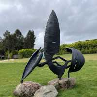 Beautiful sculpture in within a wine yard  