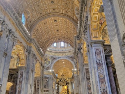 🏰 Awe-Inspiring Splendor at St. Peter’s Basilica in Vatican City 🌟  
Marvel at the grand Western-style architecture of St. Peter’s Basilica—one of the most iconic religious sites in the world and a must-see when in Rome! Whether you’re a history buff, architecture admirer, or simply seeking an unforgettable moment indoors, this place delivers with sweeping domes and majestic interiors.

🧭 Recommended Route & Must-Do Experiences:  
Start your visit early in the morning to savor quieter moments (before 9 AM is ideal!)—the sunlight streaming through the windows is magical, and queues are shorter. Wander through the main nave and pause under Michelangelo’s iconic dome. Climb the Cupola (dome) for breathtaking panoramas of Vatican City and Rome—worth every step! Don’t miss the Pietà sculpture near the entrance and the ornate Baldacchino at the altar.

📸 Insta-Worthy Photo Spots:  
Snap a dramatic shot from the center of the nave, capturing the soaring ceilings. The view from the Cupola’s outdoor terrace is absolutely legendary—skyline shots galore. Indoors, angle your camera upward to highlight intricate architectural details and play with the light filtering through stained glass.

💡 Visiting Tips:  
Dress modestly (shoulders and knees covered). Security is tight, so avoid carrying bulky bags. Entry is free, but there’s a fee for dome access. Save time by booking your Cupola climb in advance on trip.com.

⚠️ Precautions:  
Large crowds and security lines are common—bring patience and water. Photography is permitted in most areas, but respect signs and ongoing services.

#Rome #VaticanCity #StPetersBasilica #Architecture #TravelTips