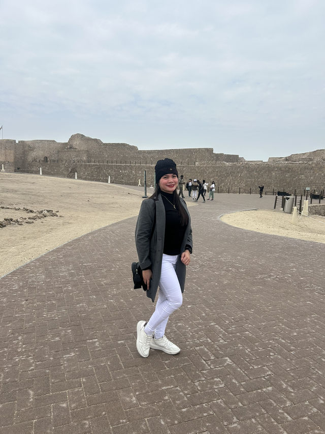 “Whispers of the Past: The Timeless Walls of Bahrain Fort”